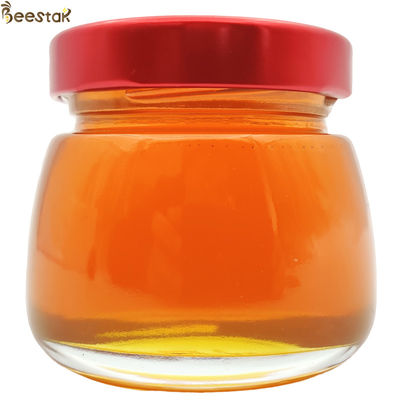 بالجملة 100% عسل النحل الطبيعي عالية الجودة العسل العضوي الخام النقي العسل العشبي التقليدي